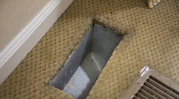 Vacuum out any dust or debris you find below the register.